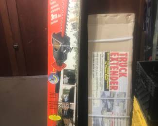 Remington electric trimmer and a pickup bed extender both new in the box!