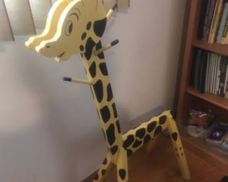 Geoffrey the giraffe clothe rack!