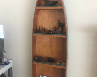 Boat shaped wall shelf