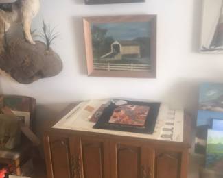 Expandable table with 2 chairs. Wall decor!