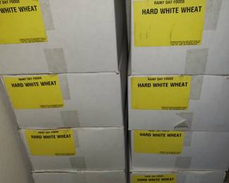 Boxes of cans of wheat