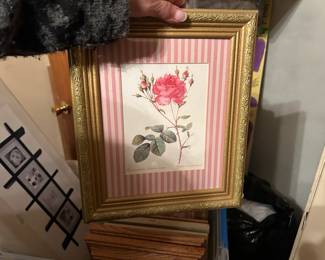 Decorative pictures and an assortment of frames 