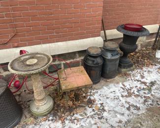 two large metal planters Urns