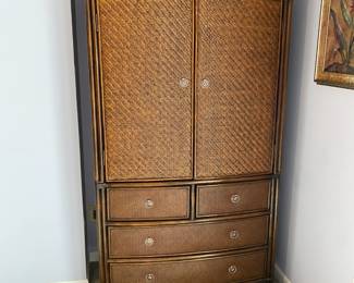 we have two Pencil Woven Rattan Armoire Storage Cabinet with piano hinges to open widely. Drawers glide in an out with ease. This is a very well taken care of Cabinet
75 inches tall
22 1/2 inches deep
38 1/2 inches wide