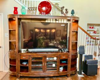 Large TV console with smart TV 75”. 