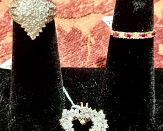 14k gold and 1.25 ct Diamond ring. 14k and 1ct diamond heart pendant, 14k and ruby and diamond ring. 