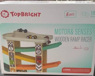 WOODEN RAMP RACER: UNIQUE TOP PARCKING LOT: 4 bright ramp racer set off from the top parking lot and then slides down the rainbow toddler race track, bringing the toddlers pleasure of racing and improving visuals tracking ability. When the game stops, the toddlers can collect the cars in the top parking lot by themselves, improving you boy and girl’s sense of storage, and prevent the cars from getting lost. This toy will encourage the development of your toddlera to cooperate and take turns to play their own race cars on the toddler race track, develop communication skills.