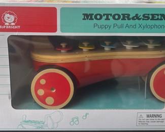 PUPPY XYLOPHONE: PUPPY PULL: Cute puppy Xylophone has 5 Metal keys for toddlers, The wooden wheels well attached to the body and has black rubber rings fixed on it to make them silent when pulling the toy.this amazing Xylophone includes sound and light, the light shows when you pull the puppy on the tail