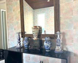 56” wide retro credenza (some type of black molded laminate), mirror 40” by 54”