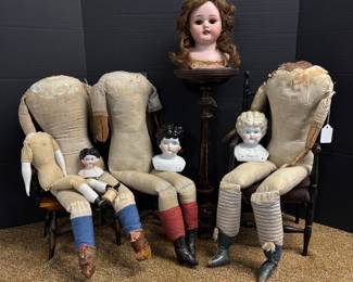 Boxes of antique, and vintage doll parts. This is just a small sampling. 