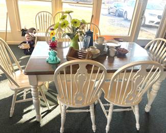 Farmhouse table with glass top covering, with 8 chairs