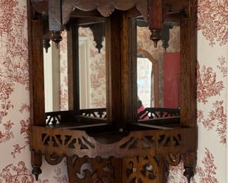 Mirrored corner curio