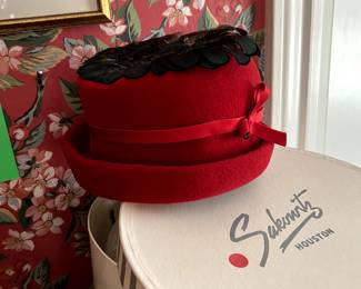 Red hat in classic Sakowtiz Houston box (former name for Saks Fifth Avenue)