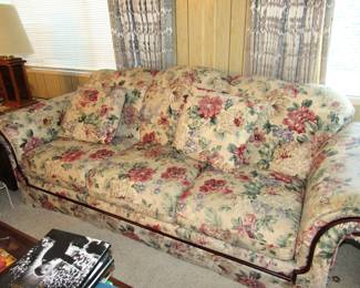 Floral sleeper couch.