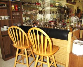 Belly up to the bar! Bar and chairs are for sale.