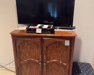 French entertainment cabinet & a 46" Sony Bravia and LG - DVD / VHS player