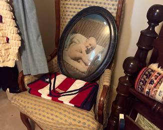Elegant high back chair & an antique convex glass frame