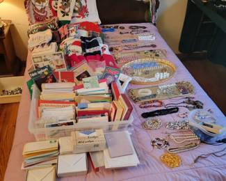 Christmas towels and cards. Jewelry and necklaces. Jamestown bed frame with bed.