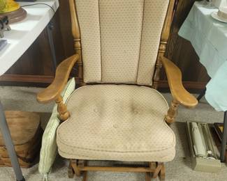 Glider rocking chair.