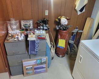Golf clubs and golfing supplies.