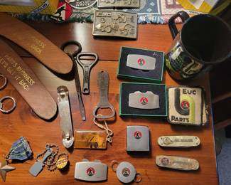 The Euclid Company, pocket knives, coffee mug. 
Vintage bottle openers.