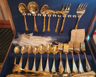 Beautiful Rodgers Gold tone silverware set, in original box.