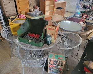 Vintage Coleman camping stove. Outdoor patio furniture.