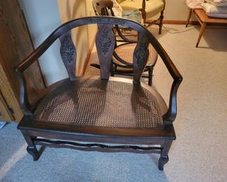 Antique caned bench. Excellent condition.