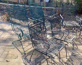 Many metal patio chairs