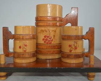carved wood stein set 