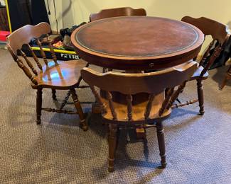 Leather topped table and 4 chairs (sold separately)....