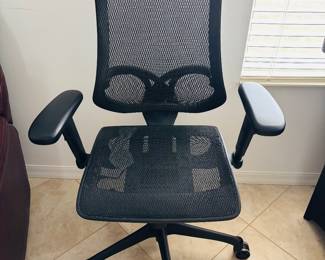 The red / black chair is versatile.