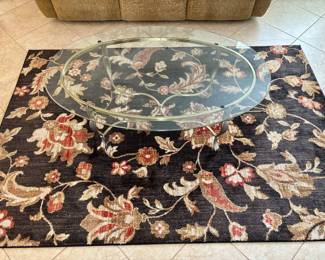 Glass table so you can enjoy all of the "lovely" rug.