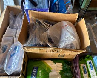 LOTS of NEAR MINT OR NEW CONDITION health supplies! Bath chair, Toilet, pads etc…
