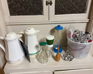 Nice tub of vintage cookie cutters to the right! 