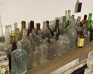 We found a HUGE trunk under the basement stairs FILLED with antique bottles! They range in date from the civil war period, to present day! SO many great pieces!