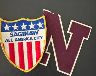 A cookie of cooks vintage Saginaw patches! One is the All American CIty and the other is the Maroon N for North Intermediate School! 