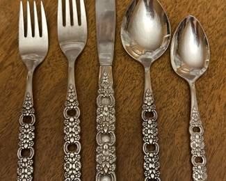 This is an OUTSTANDING 107 Piece set of (Stainless) by ONEIDA SILVER - The pattern is Viola-Voila! This is the typical 5 piece table set. Knife, Dinner Fork, Salad Fork, Tablespoon and Teaspoon.