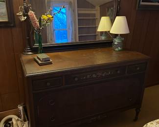 Got the keys on Tuesday! Here are the pics for the initial walk through! We did not open any boxes or totes! This is just what was out waiting for us! More detailed photos added almost daily starting this week! A beautiful large vintage dresser with mirror! Lovely and painted trim! 