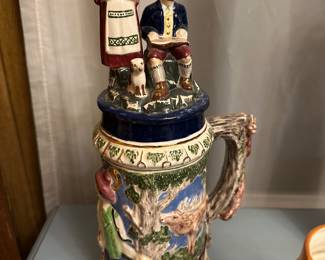 This stein is LARGE and has a beautiful lid with figurines!