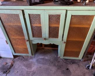 The garage has some terrific vintage items! This is a great cabinet! It looks to be the top to an old china cabinet! 
