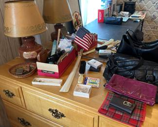 The Dresser tops have assorted smalls - Purses, Gloves, and assorted tchotchkes. 