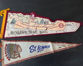 There are multiple vintage Penants, but these two stuck out They are VERY well made and are Native American Themed! 