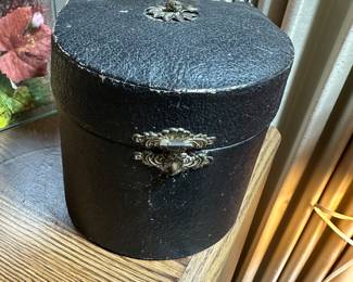 This was a LATE surprise! It was found inside a box of books! This is a small leather case from the Victorian Period…what does it contain?