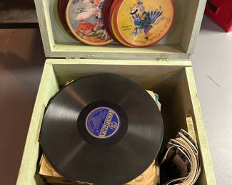 This small wooden chest was hidden under the basement stairs! I nearly broke my back pulling it out as it is so heavy! Inside we found an treasure trove of old vintage records! 