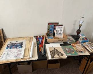 Ab table filled with vintage ephemera items