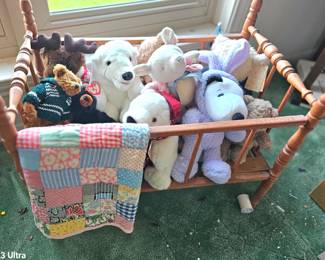 A vintage crib full ob babies