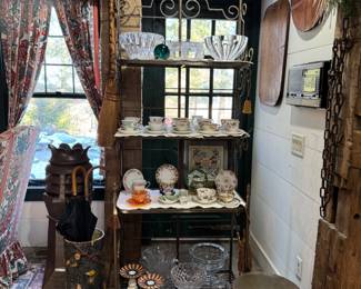 Many gorgeous teacups and saucers