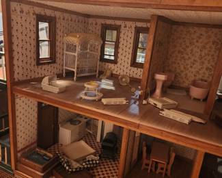 HUGE doll house with power and lots of Furniture. 4x3 approx 3.5 tall
3 stories. In very nice condition 