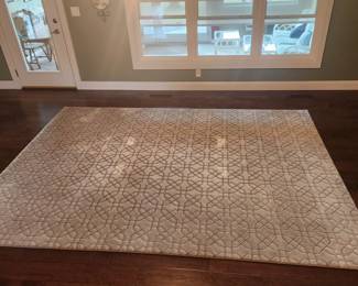 Gorgeous area rug is in perfect condition. High quality. Modern design 
